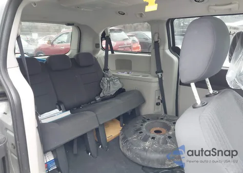 2010 Dodge Grand Caravan Sxt z USA, uszkodzony, nr VIN 2D4RN5D12AR119896